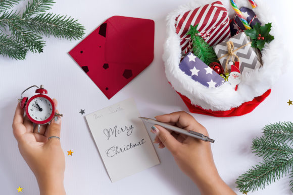 Christmas Card Mockup with Woman’s Hand